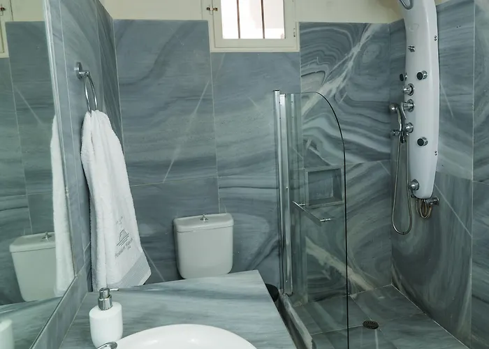 Poseidon Mansion Sunset * Oia